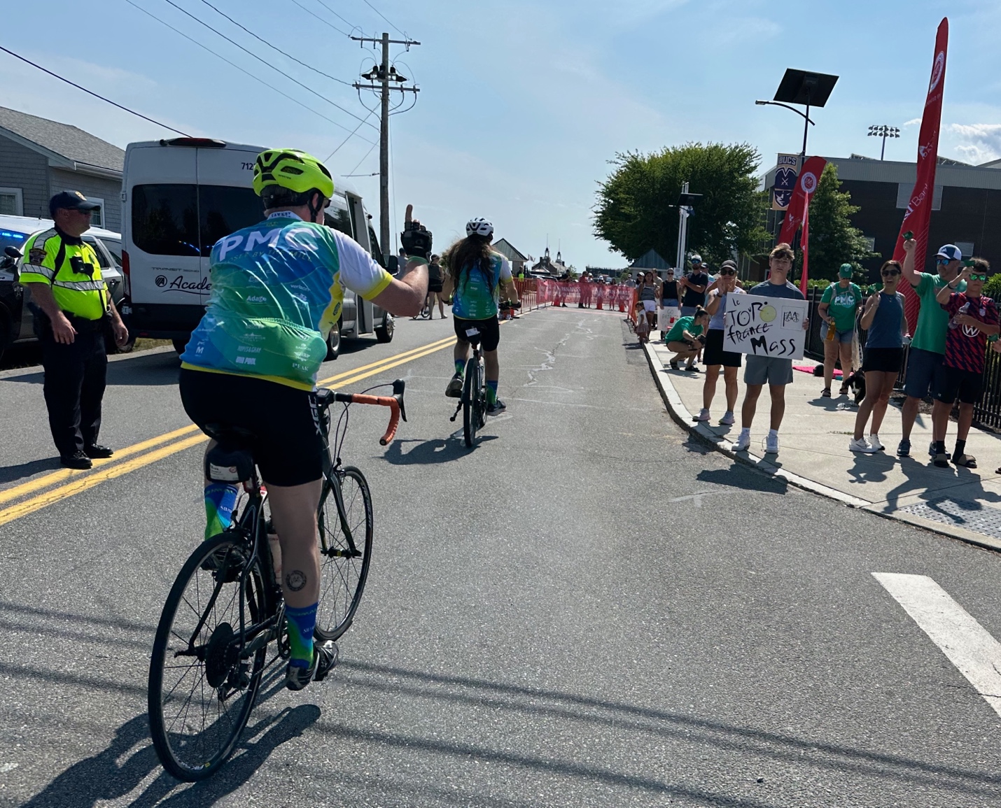A group of people riding bikes on a street
AI-generated content may be incorrect.
