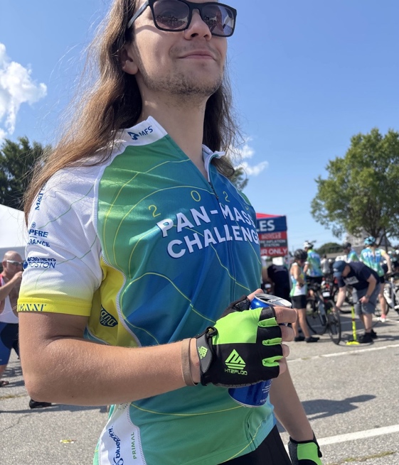 A person wearing sunglasses and cycling outfit
AI-generated content may be incorrect.