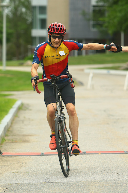 A person riding a bicycle

Description automatically generated with medium confidence